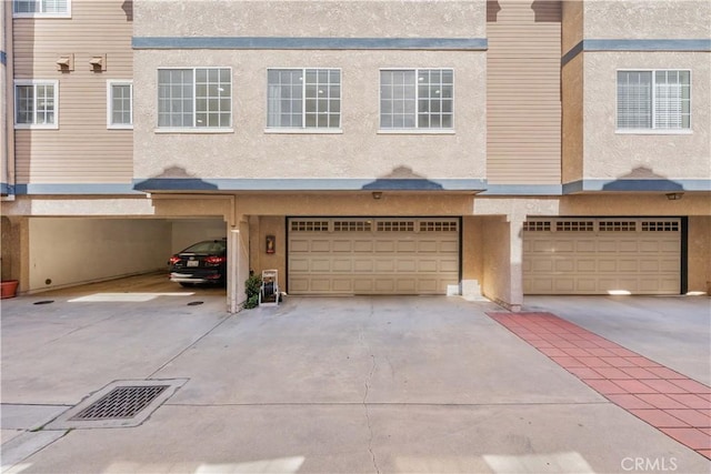 150 Diamond St Unit B, Arcadia, CA 91006 - view of front of property featuring stucco siding and an attached garage