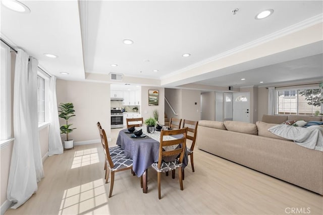 150 Diamond St Unit B, Arcadia, CA 91006 - dining space with a raised ceiling, light wood finished floors, ornamental molding, and recessed lighting