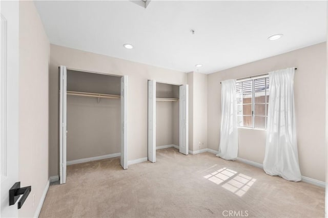 150 Diamond St Unit B, Arcadia, CA 91006 - unfurnished bedroom with multiple closets, carpet floors, and recessed lighting