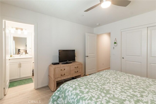1827 Montecito Ln, Redlands, CA 92374 - bedroom featuring light wood finished floors, a closet, connected bathroom, and a ceiling fan
