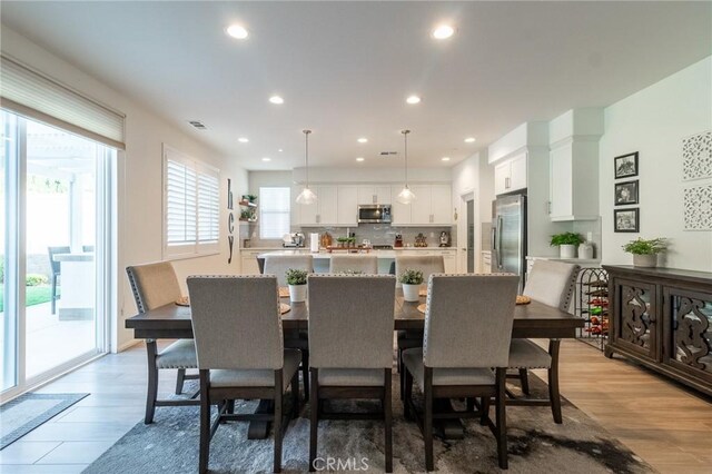 1827 Montecito Ln, Redlands, CA 92374 - dining area with light wood-style flooring and recessed lighting