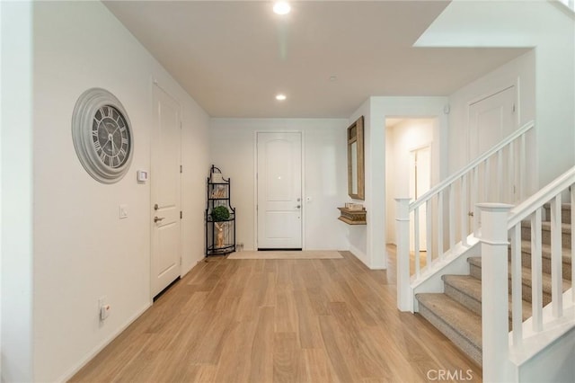 1827 Montecito Ln, Redlands, CA 92374 - foyer entrance featuring light wood-style floors, recessed lighting, and stairs