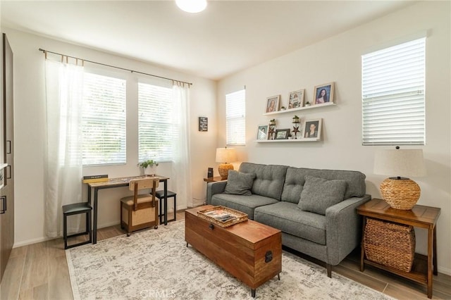 1827 Montecito Ln, Redlands, CA 92374 - living area with light wood-style floors and baseboards