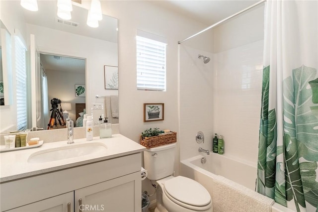 1827 Montecito Ln, Redlands, CA 92374 - bathroom featuring shower / tub combo with curtain, vanity, and healthy amount of natural light