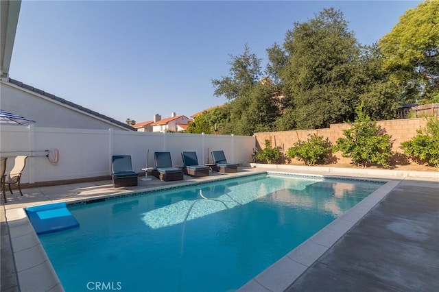 1827 Montecito Ln, Redlands, CA 92374 - view of swimming pool with a fenced backyard and a patio