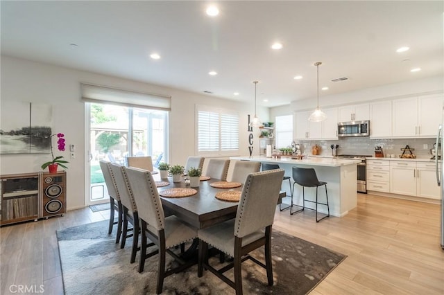 1827 Montecito Ln, Redlands, CA 92374 - dining area featuring light wood-type flooring and recessed lighting