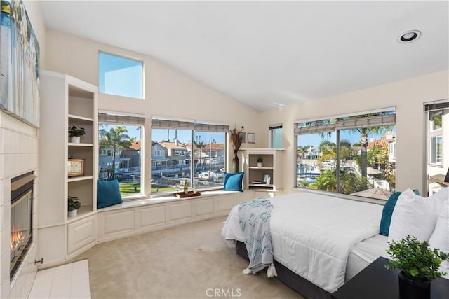 331 Parsons Lndg, Long Beach, CA 90803 - bedroom featuring lofted ceiling, a fireplace, light colored carpet, and recessed lighting