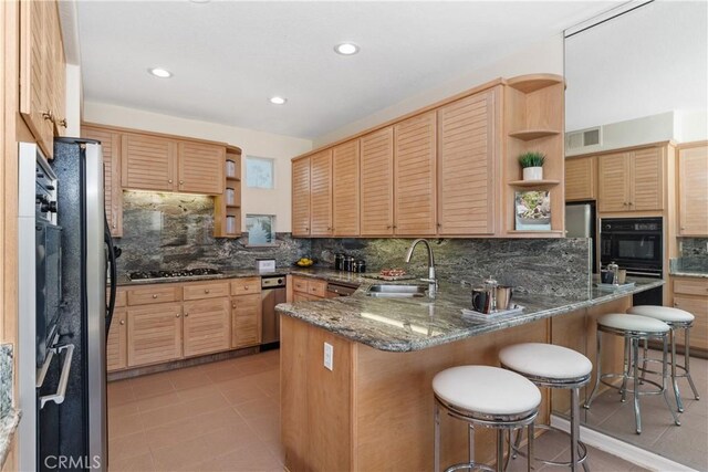 331 Parsons Lndg, Long Beach, CA 90803 - kitchen featuring open shelves, a peninsula, backsplash, stainless steel appliances, and recessed lighting