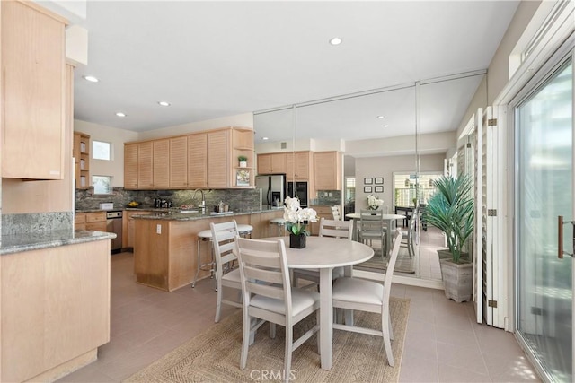 331 Parsons Lndg, Long Beach, CA 90803 - dining area featuring light tile patterned flooring and recessed lighting