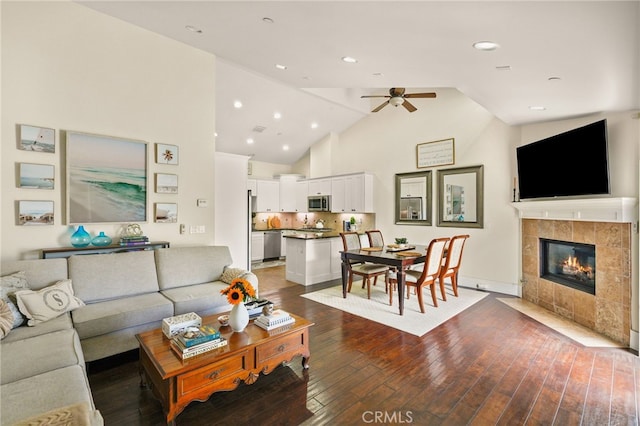 806 N Irena Ave Unit A, Redondo Beach, CA 90277 - living room with ceiling fan, hardwood / wood-style floors, a tiled fireplace, high vaulted ceiling, and recessed lighting