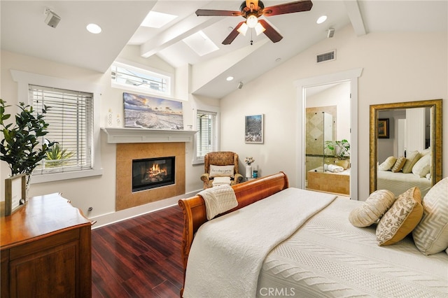 806 N Irena Ave Unit A, Redondo Beach, CA 90277 - bedroom with dark wood-type flooring, a tile fireplace, ensuite bathroom, recessed lighting, and a skylight