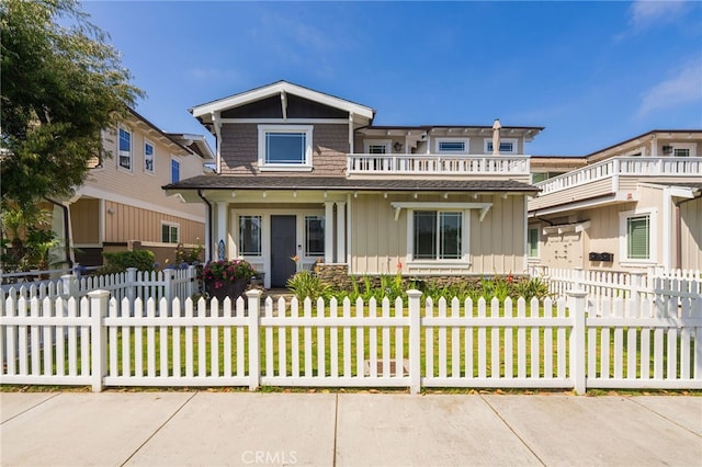 806 N Irena Ave Unit A, Redondo Beach, CA 90277 - craftsman-style house featuring a fenced front yard, a balcony, and board and batten siding