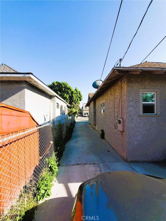 211 W 52nd St, Los Angeles, CA 90037 - view of property exterior with stucco siding