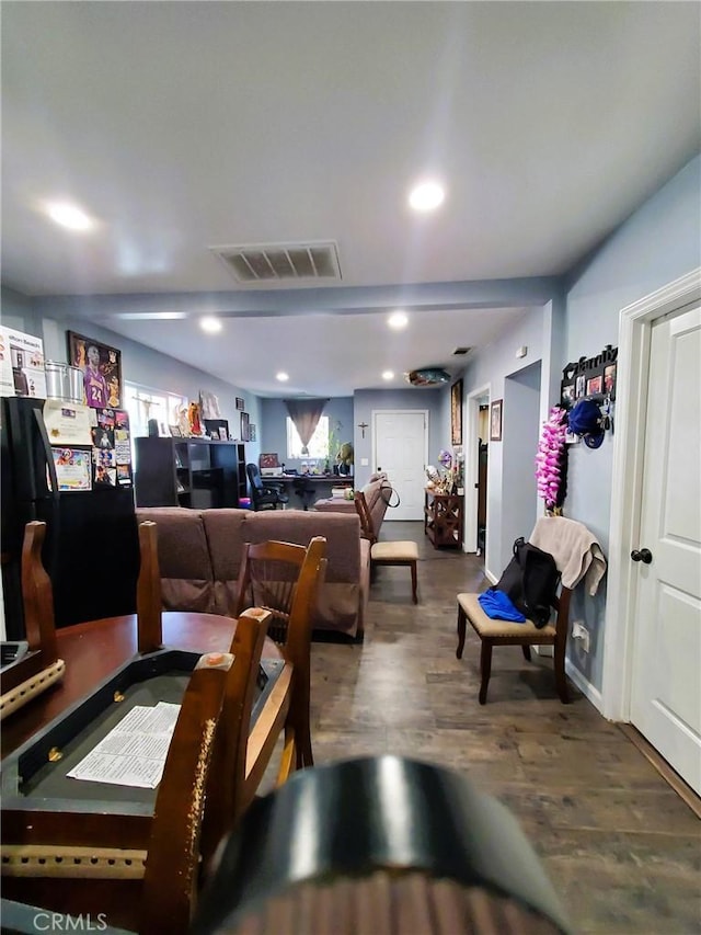 211 W 52nd St, Los Angeles, CA 90037 - dining space with wood finished floors and recessed lighting