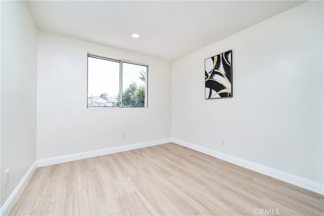 23760 Timber Bluff Ct, Moreno Valley, CA 92557 - spare room with light wood finished floors and recessed lighting