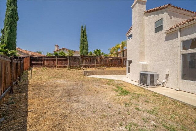 23760 Timber Bluff Ct, Moreno Valley, CA 92557 - fenced backyard featuring a patio