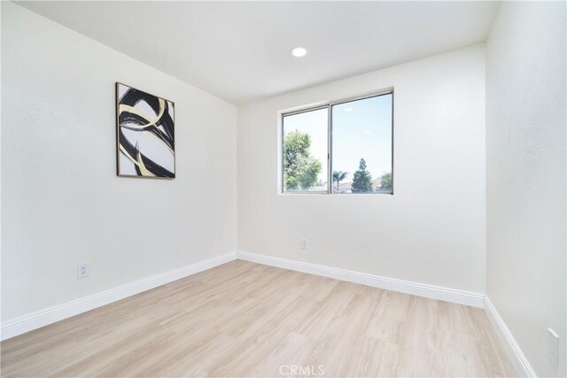 23760 Timber Bluff Ct, Moreno Valley, CA 92557 - empty room featuring light wood finished floors and recessed lighting