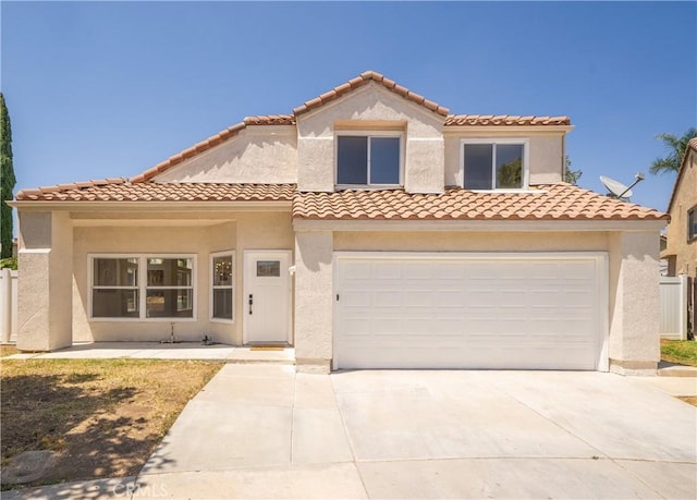 23760 Timber Bluff Ct, Moreno Valley, CA 92557 - mediterranean / spanish-style house featuring concrete driveway, stucco siding, a garage, and a tiled roof