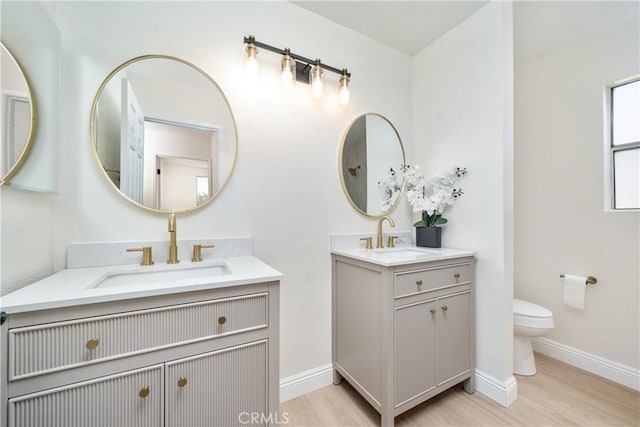 23760 Timber Bluff Ct, Moreno Valley, CA 92557 - bathroom with two vanities and wood finished floors