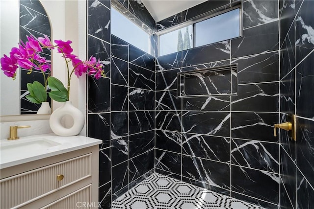 23760 Timber Bluff Ct, Moreno Valley, CA 92557 - bathroom featuring vanity and tiled shower