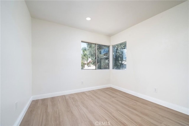 23760 Timber Bluff Ct, Moreno Valley, CA 92557 - empty room featuring light wood-style flooring and recessed lighting