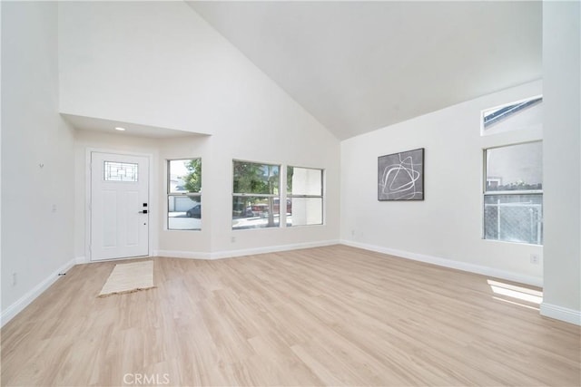23760 Timber Bluff Ct, Moreno Valley, CA 92557 - entrance foyer featuring high vaulted ceiling and light wood finished floors