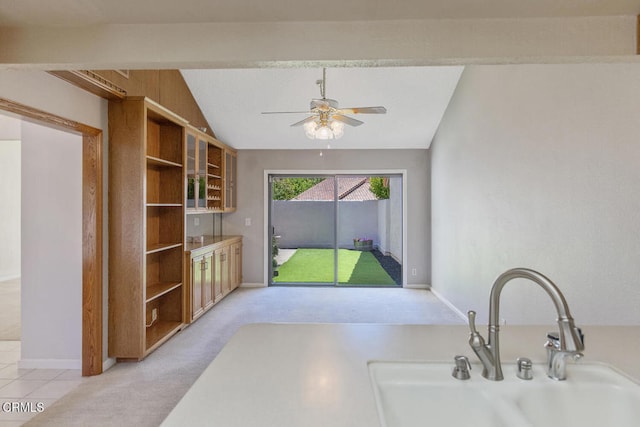 4062 Bridgewood Ln, Thousand Oaks, CA 91362 - kitchen with open shelves, a ceiling fan, vaulted ceiling, and light carpet