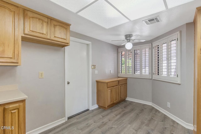 4062 Bridgewood Ln, Thousand Oaks, CA 91362 - kitchen with a ceiling fan, light wood-style flooring, and light countertops