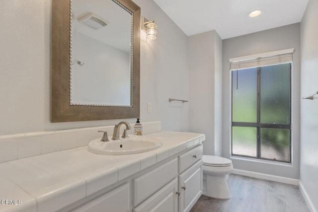 4062 Bridgewood Ln, Thousand Oaks, CA 91362 - bathroom featuring vanity, wood finished floors, and recessed lighting