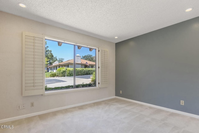 4062 Bridgewood Ln, Thousand Oaks, CA 91362 - carpeted spare room with a textured ceiling and recessed lighting