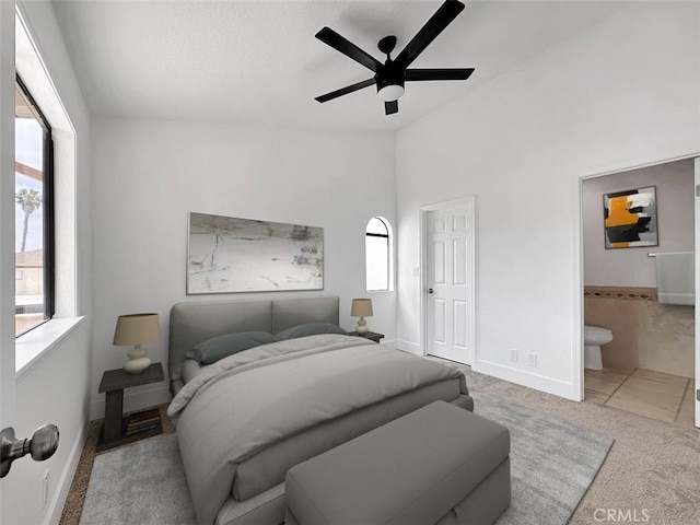 17333 Brookhurst St Unit D6, Fountain Valley, CA 92708 - bedroom with carpet, lofted ceiling, ensuite bath, and ceiling fan