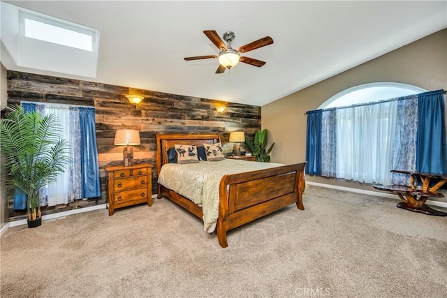 17432 Sendero Way, Lower Lake, CA 95457 - bedroom featuring vaulted ceiling, wooden walls, carpet floors, and a ceiling fan