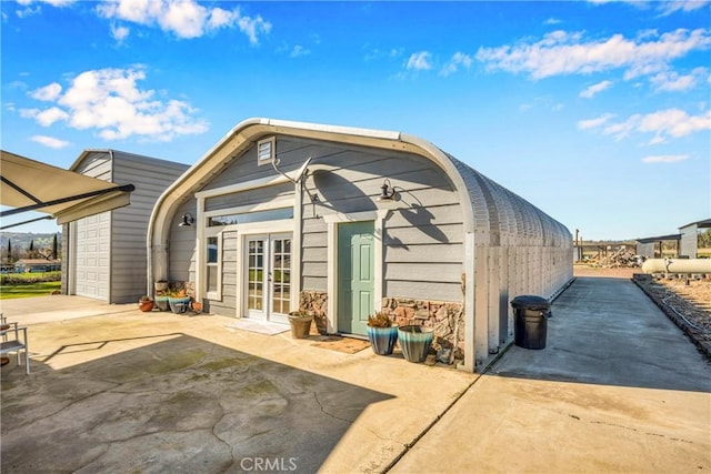 17432 Sendero Way, Lower Lake, CA 95457 - view of outbuilding featuring french doors and concrete driveway