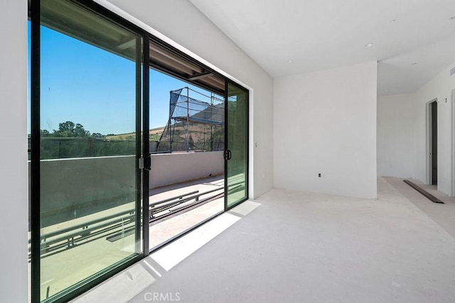 581 Higuera St Unit 306, San Luis Obispo, CA 93401 - spare room with concrete floors and a sunroom