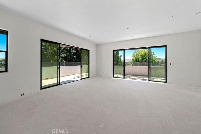 581 Higuera St Unit 306, San Luis Obispo, CA 93401 - spare room with concrete floors
