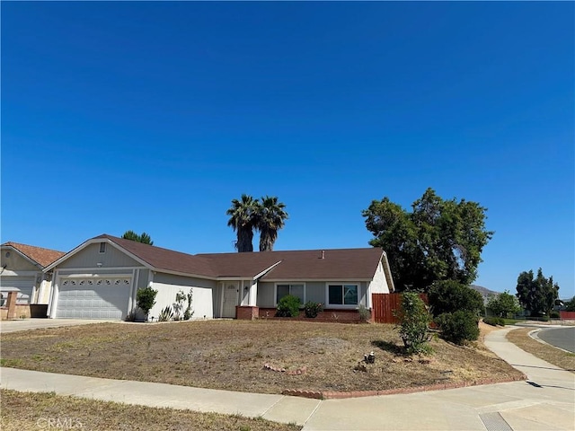 22692 Abington Pl, Moreno Valley, CA 92553 - ranch-style home with an attached garage and driveway