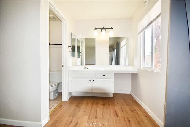 22692 Abington Pl, Moreno Valley, CA 92553 - bathroom featuring wood finished floors and vanity