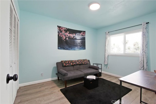 23011 Aspan St, Lake Forest, CA 92630 - living room featuring light wood-style flooring and baseboards