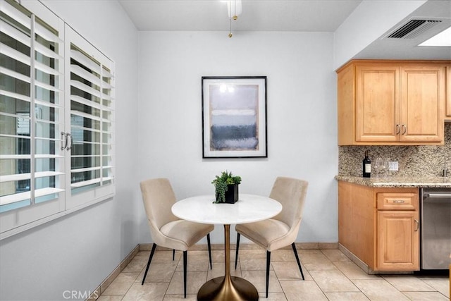 14844 Dickens St Unit 208, Sherman Oaks, CA 91403 - dining space with light tile patterned floors