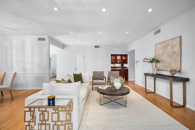 14844 Dickens St Unit 208, Sherman Oaks, CA 91403 - living area featuring wood finished floors and recessed lighting