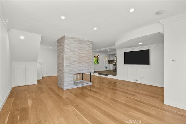 4919 Dunsmore Ave, La Crescenta, CA 91214 - unfurnished living room featuring recessed lighting, light wood-style flooring, crown molding, and a fireplace