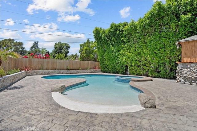 4919 Dunsmore Ave, La Crescenta, CA 91214 - view of swimming pool featuring a fenced backyard, a pool with connected hot tub, and a patio