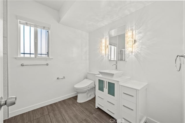 4919 Dunsmore Ave, La Crescenta, CA 91214 - bathroom with vanity and wood finished floors