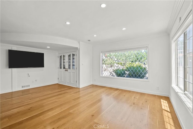 4919 Dunsmore Ave, La Crescenta, CA 91214 - unfurnished living room with crown molding, healthy amount of natural light, light wood-style floors, and recessed lighting
