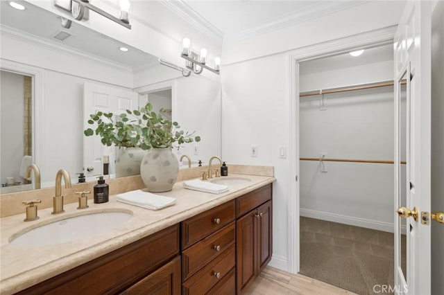 403 Vista Parada, Newport Beach, CA 92660 - full bath with double vanity, crown molding, a spacious closet, and recessed lighting