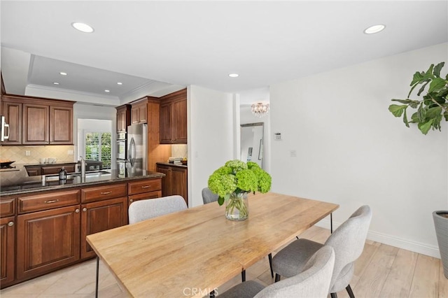 403 Vista Parada, Newport Beach, CA 92660 - dining room with recessed lighting, crown molding, light wood-type flooring, and a tray ceiling