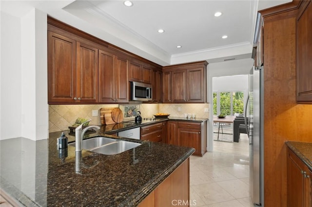 403 Vista Parada, Newport Beach, CA 92660 - kitchen featuring stainless steel appliances, ornamental molding, dark stone countertops, tasteful backsplash, and recessed lighting