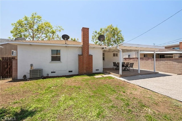 2321 W 182nd St, Torrance, CA 90504 - rear view of property with crawl space, a fenced backyard, a chimney, and stucco siding