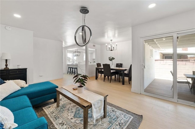 2321 W 182nd St, Torrance, CA 90504 - living room featuring a chandelier, light wood-style floors, and recessed lighting