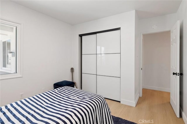 2321 W 182nd St, Torrance, CA 90504 - bedroom with light wood finished floors and a closet